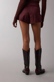 SUEDE STUDDED DETAIL ASYMMETRIC WRAPPED MINI SKORT