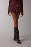 SUEDE STUDDED DETAIL ASYMMETRIC WRAPPED MINI SKORT