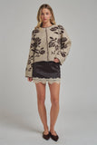 SATIN TEXTURE MINI SKIRT WITH EYELASH LACE AND SHORTS LINING