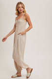 GAUZE SMOCKED BUTTON FRONT SHOULDER TIE JUMPSUIT