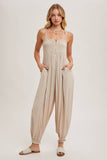 GAUZE SMOCKED BUTTON FRONT SHOULDER TIE JUMPSUIT