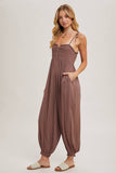 GAUZE SMOCKED BUTTON FRONT SHOULDER TIE JUMPSUIT