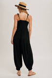 GAUZE SMOCKED BUTTON FRONT SHOULDER TIE JUMPSUIT