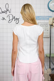WASHED EXPOSED SEAM HENLEY RIBBED KNIT TOP