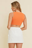 SLEEVELESS TASSLE HEM KNIT TANK