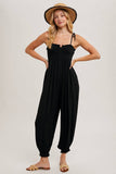 GAUZE SMOCKED BUTTON FRONT SHOULDER TIE JUMPSUIT