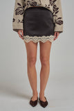 SATIN TEXTURE MINI SKIRT WITH EYELASH LACE AND SHORTS LINING